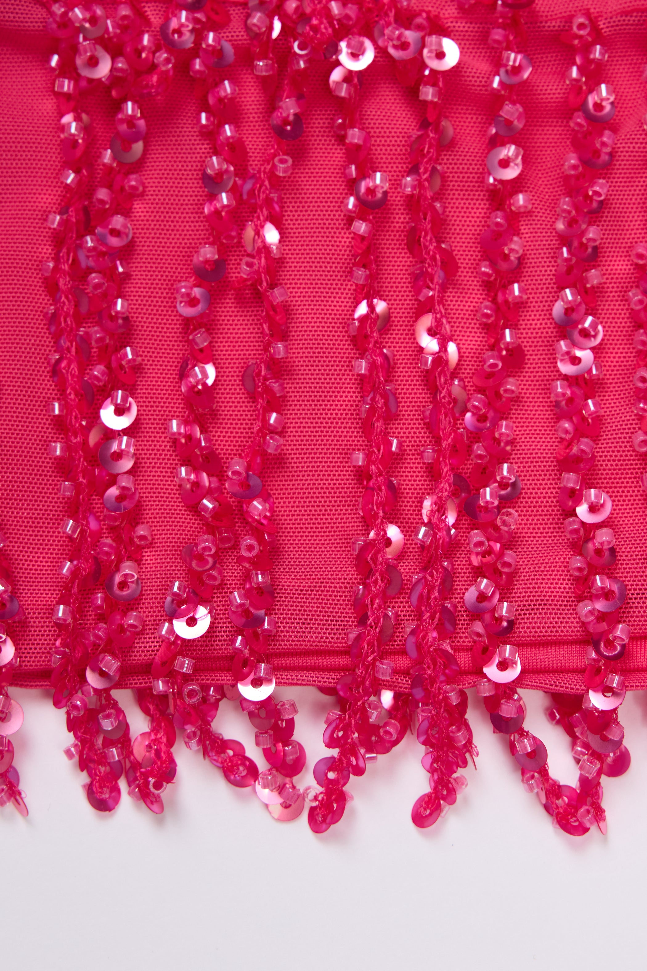 Fringed Low-Rise Mini Skirt in Raspberry