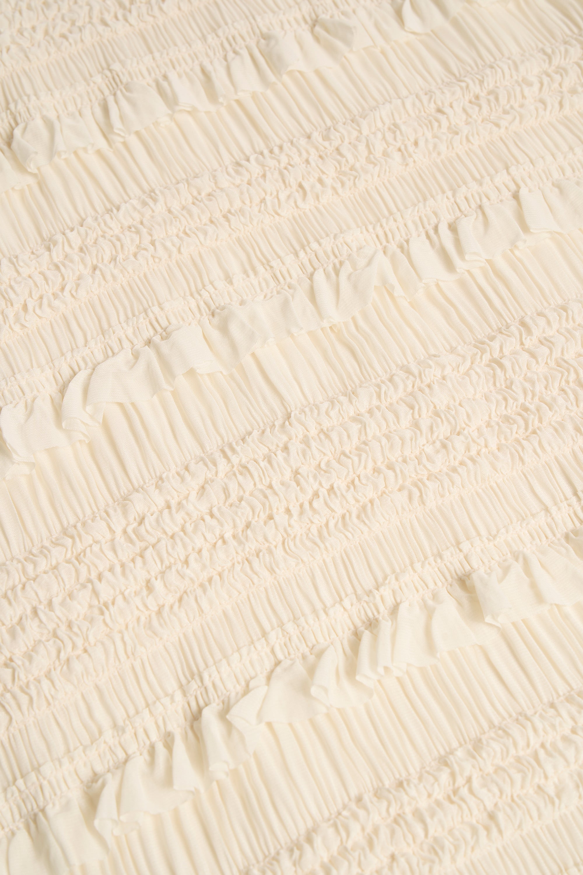 Ruffled Mid-Rise Shorts in Ivory
