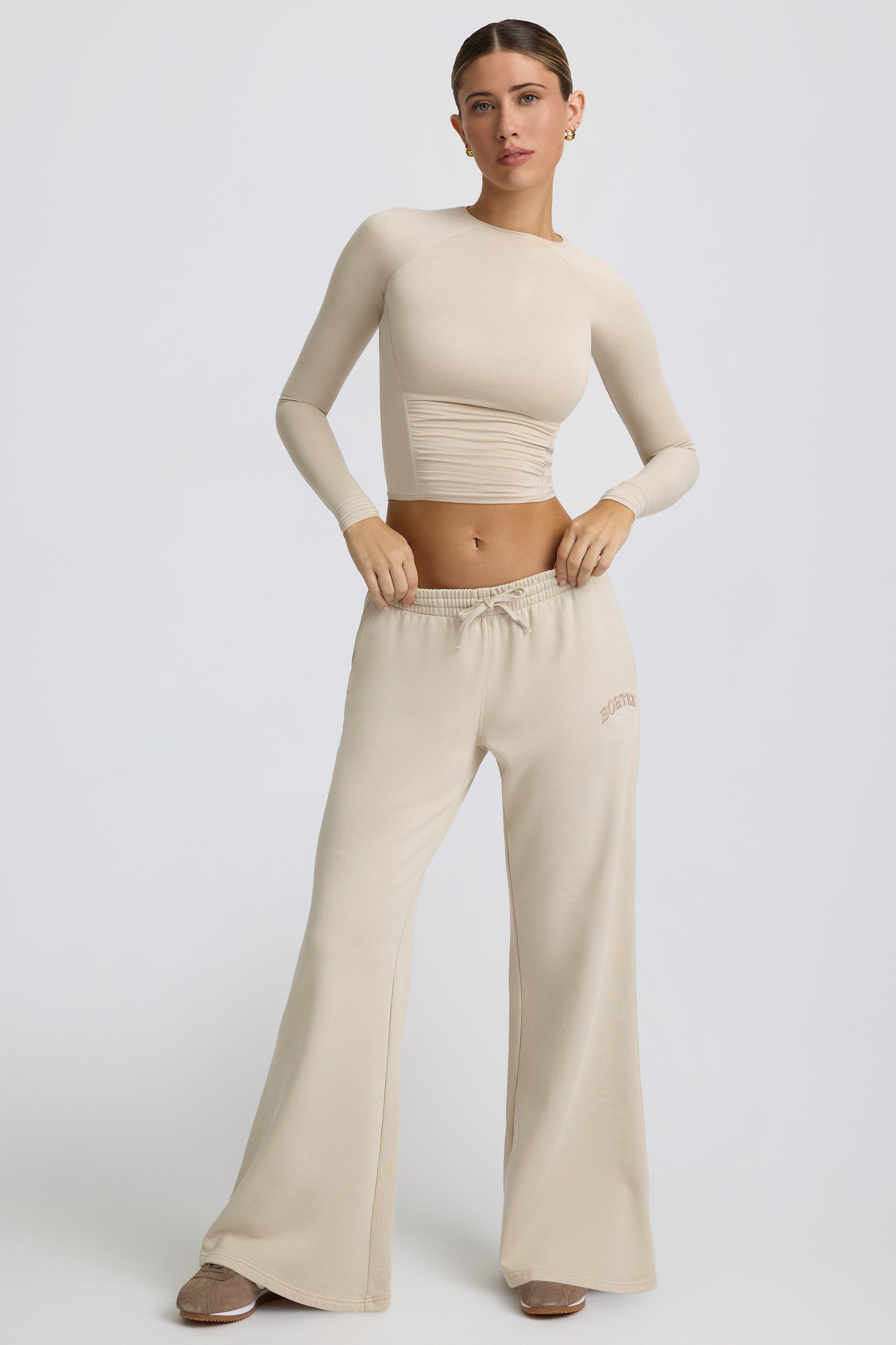 Low-Rise Wide-Leg Joggers in Bone - 1